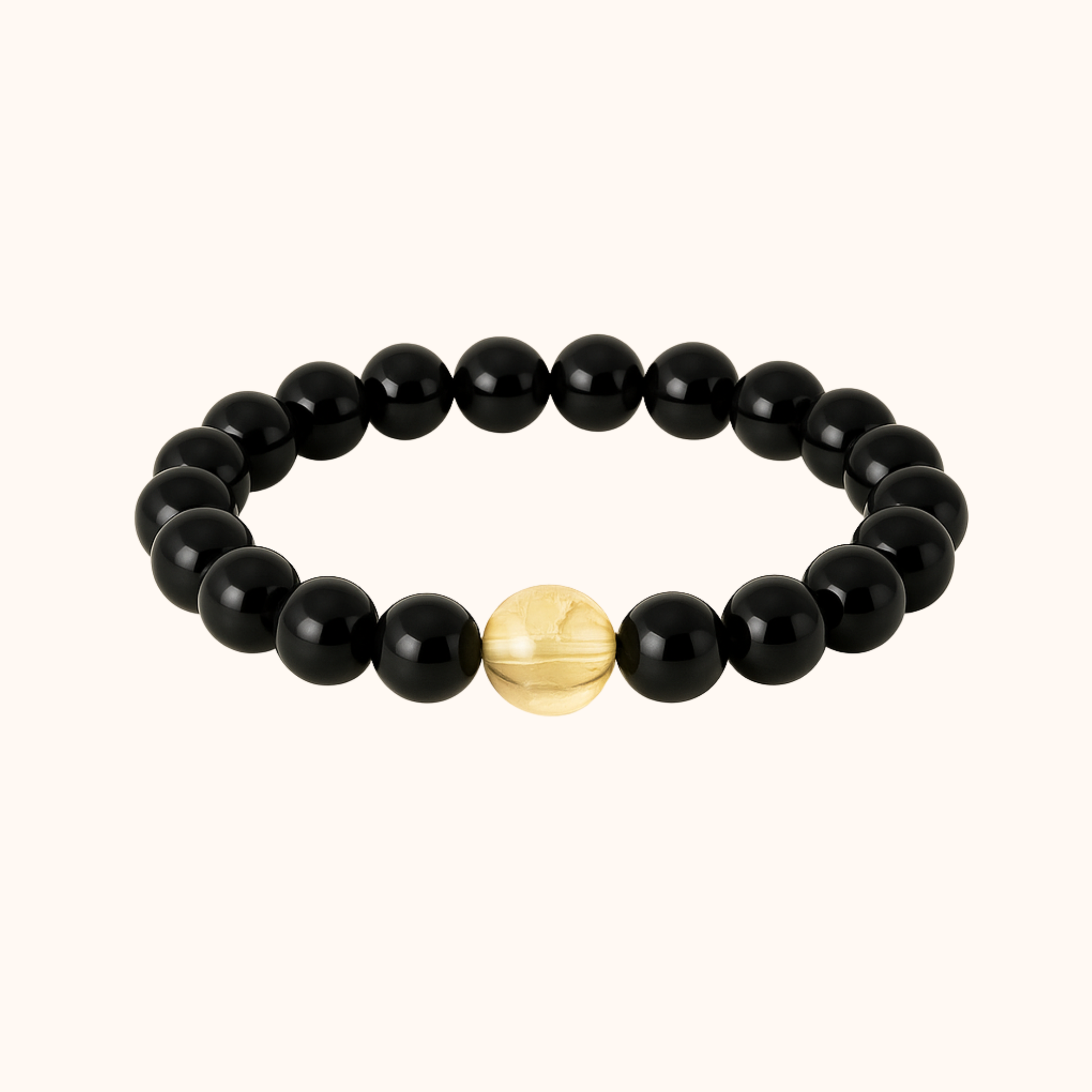 Black beaded bracelet with a gold accent bead on a white background